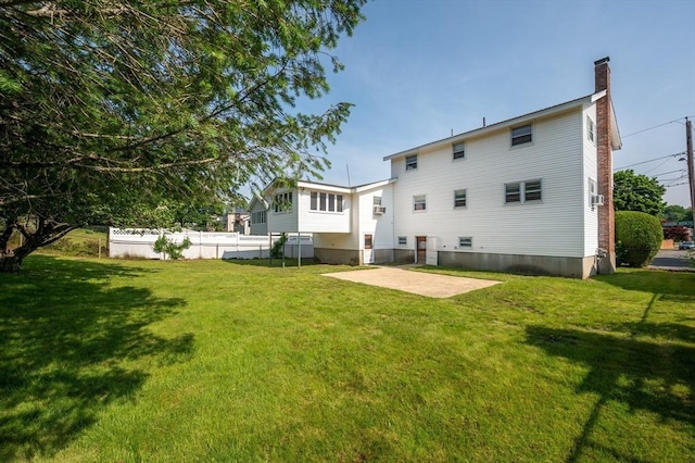34 Buena Vista Ave, Salem, MA 01970 - rear view of property featuring a chimney and a patio