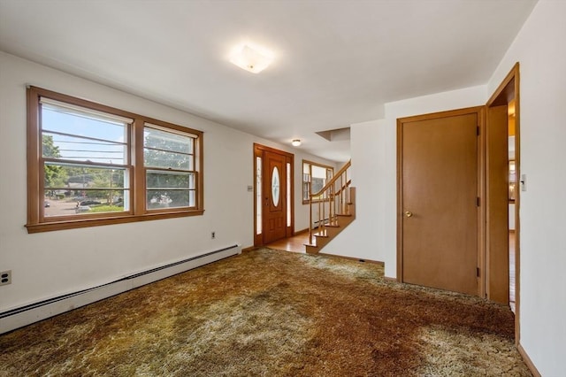 34 Buena Vista Ave, Salem, MA 01970 - carpeted entryway with a baseboard heating unit and stairway