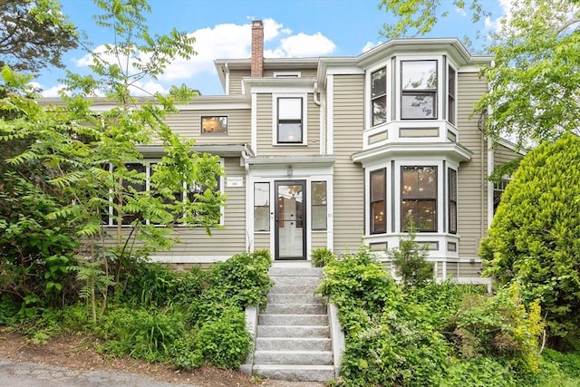 23 Centre Ave, Belmont, MA 02478 - townhome / multi-family property with a chimney