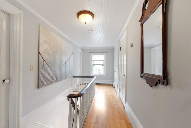 23 Centre Ave, Belmont, MA 02478 - hallway featuring crown molding, light wood finished floors, and an upstairs landing