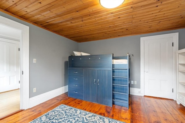 23 Centre Ave, Belmont, MA 02478 - unfurnished bedroom with wooden ceiling, hardwood / wood-style floors, baseboards, and crown molding