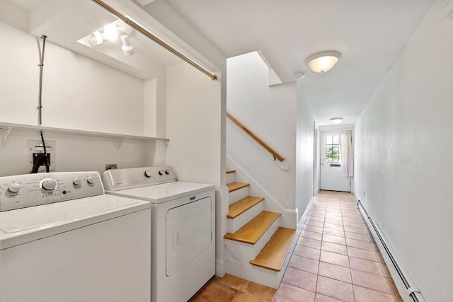 23 Centre Ave, Belmont, MA 02478 - laundry area featuring a baseboard radiator, washing machine and clothes dryer, light tile patterned floors, and baseboards