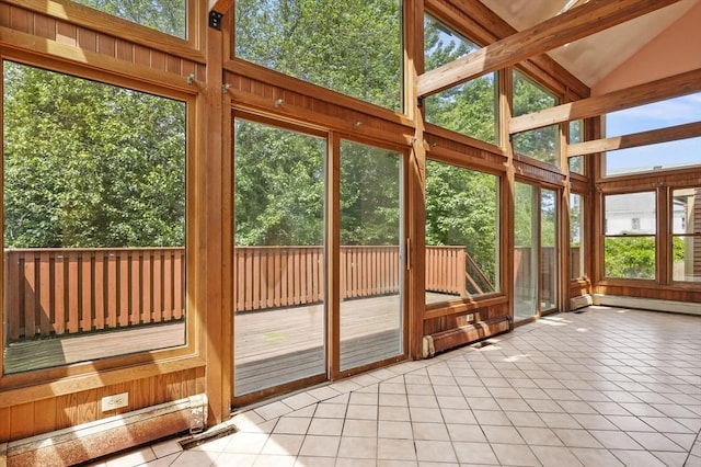 3 Westview Ter, Woburn, MA 01801 - unfurnished sunroom featuring tile patterned floors, a wooden deck, baseboard heating, and high vaulted ceiling