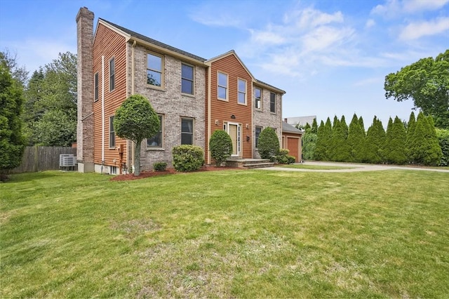 3 Westview Ter, Woburn, MA 01801 - view of front of house featuring a garage, a chimney, and cooling unit
