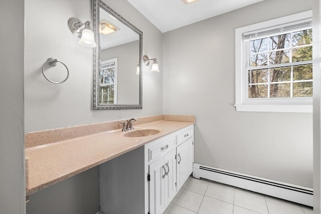 bathroom featuring vanity, tile patterned floors, and a baseboard radiator