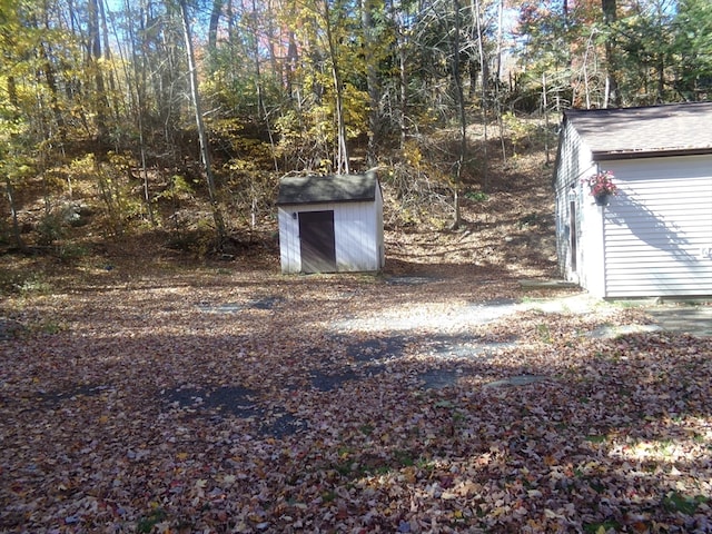 exterior space with a storage shed