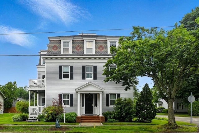 38 Moseley Ave Unit 5, Newburyport, MA 01950 - second empire-style home with mansard roof, a balcony, and a front lawn