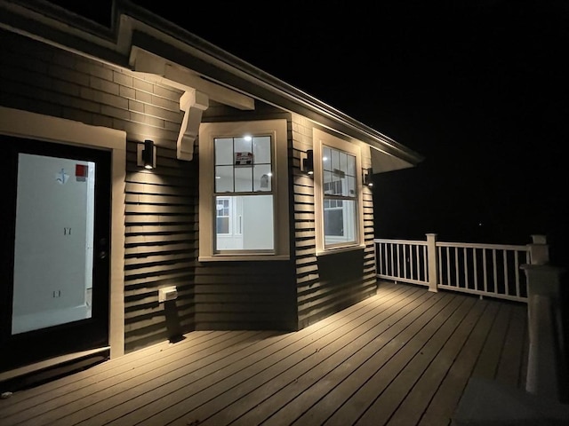 view of deck at twilight