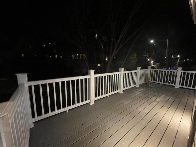 view of deck at twilight