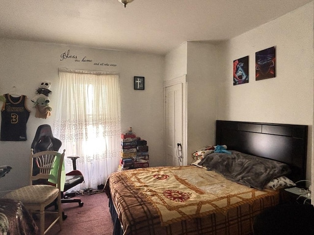 bedroom featuring carpet flooring