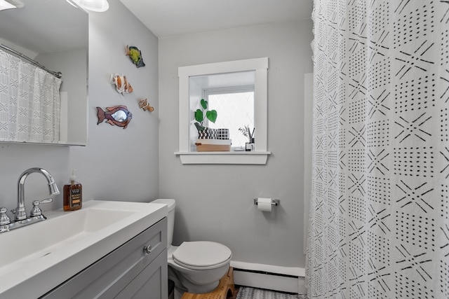 bathroom with baseboard heating, curtained shower, vanity, and toilet