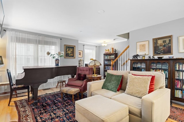 2 Heron Way Unit B, Salisbury, MA 01952 - living area featuring ornamental molding, wood finished floors, and stairway