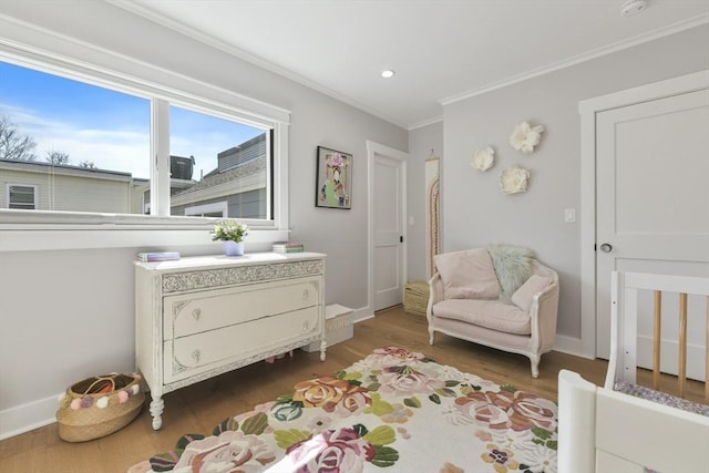440 Cambridge St Unit 2, Cambridge, MA 02141 - bedroom with crown molding, wood finished floors, and recessed lighting