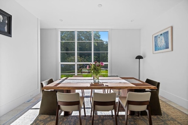 dining room with visible vents