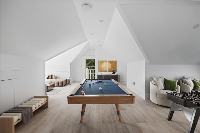 game room featuring lofted ceiling, pool table, and wood finished floors