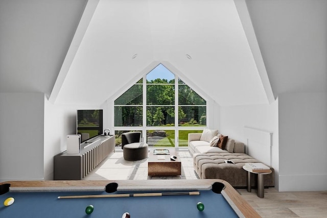 game room featuring vaulted ceiling, pool table, and wood finished floors