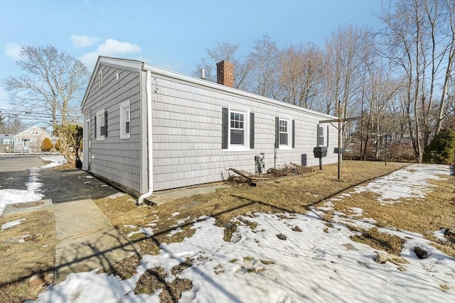 view of snow covered property