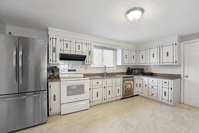 kitchen with white cabinetry, sink, decorative backsplash, and appliances with stainless steel finishes