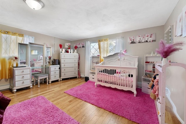 bedroom featuring hardwood / wood-style flooring