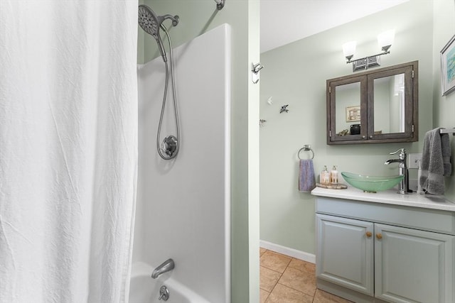 bathroom with tile patterned floors, vanity, and shower / tub combo