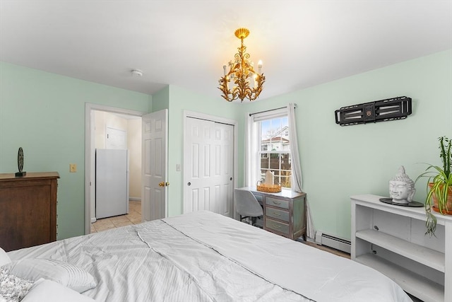 bedroom featuring light tile patterned floors, a baseboard radiator, and an inviting chandelier