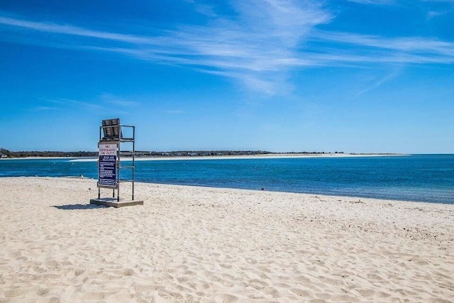 view of water feature with a beach view