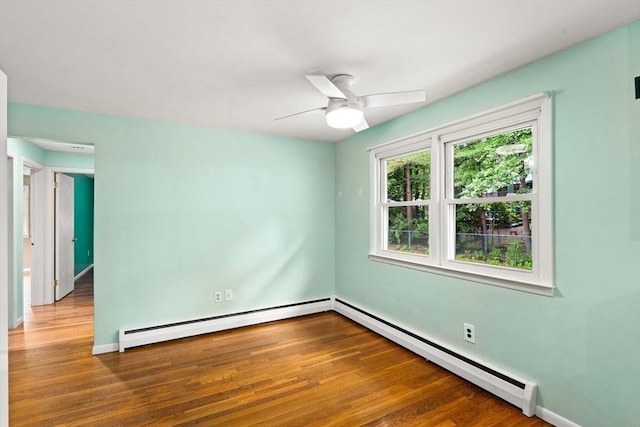 8 Grandview St, South Hadley, MA 01075 - empty room featuring a baseboard radiator, wood finished floors, and ceiling fan