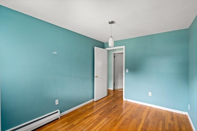 8 Grandview St, South Hadley, MA 01075 - unfurnished room with baseboard heating and wood finished floors