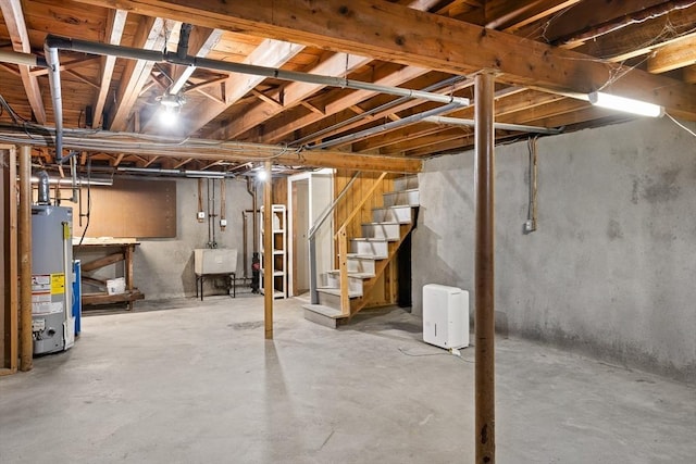 8 Grandview St, South Hadley, MA 01075 - unfinished basement with gas water heater and stairway