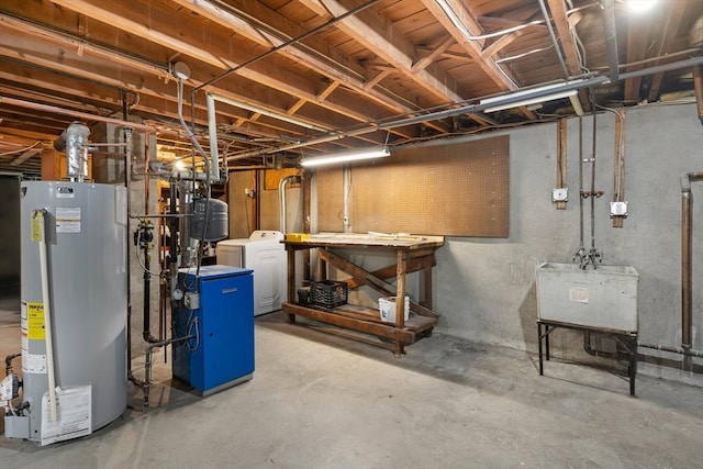 8 Grandview St, South Hadley, MA 01075 - unfinished below grade area with water heater, washer / clothes dryer, and a heating unit