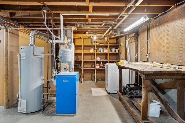 8 Grandview St, South Hadley, MA 01075 - unfinished basement with gas water heater, a heating unit, and washer / dryer