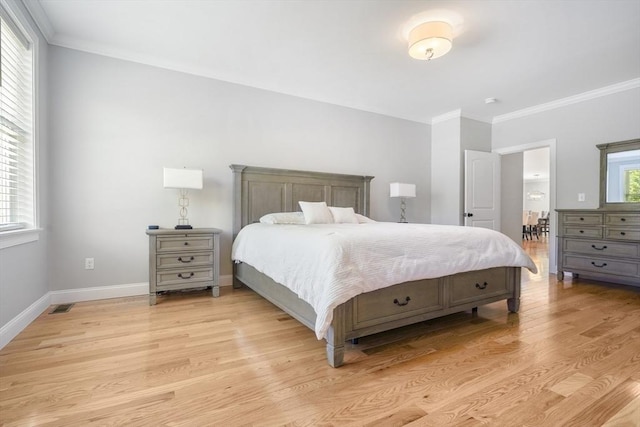 57 Sophia Dr, Rehoboth, MA 02769 - bedroom featuring ornamental molding, light wood-style flooring, visible vents, and multiple windows