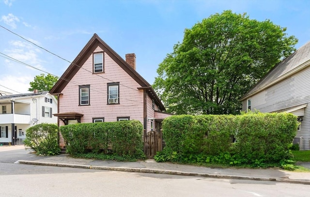 112 Lawrence St, Fitchburg, MA 01420 - view of home's exterior featuring a chimney