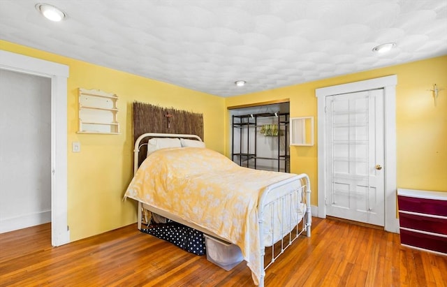112 Lawrence St, Fitchburg, MA 01420 - bedroom featuring wood finished floors and baseboards