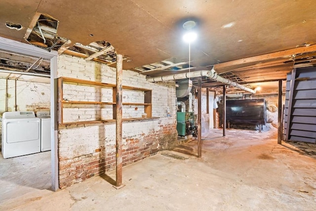 112 Lawrence St, Fitchburg, MA 01420 - unfinished basement featuring oil tank, separate washer and dryer, and a heating unit