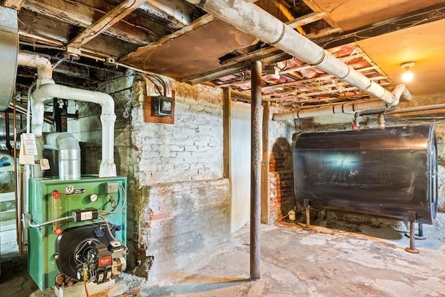 112 Lawrence St, Fitchburg, MA 01420 - unfinished below grade area featuring oil tank