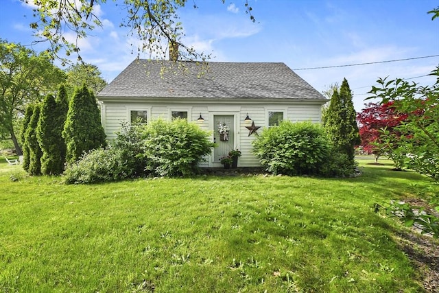 581 Middle Rd, Acushnet, MA 02743 - view of front of home with a front yard and a shingled roof