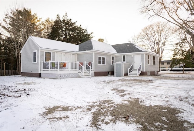 view of snow covered property