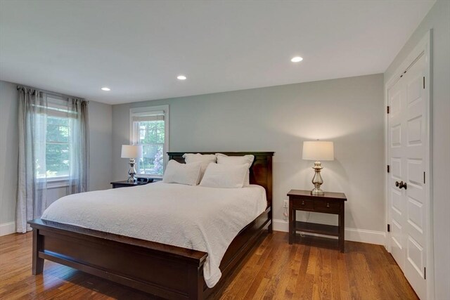 122 Crescent Rd, Concord, MA 01742 - bedroom featuring wood finished floors and recessed lighting