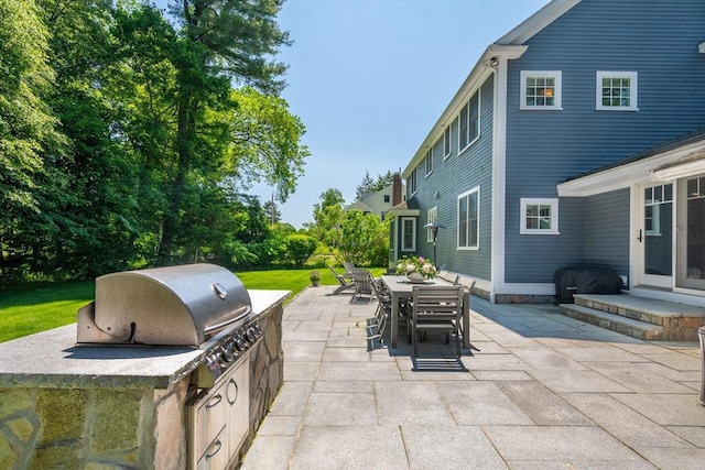 122 Crescent Rd, Concord, MA 01742 - view of patio / terrace featuring exterior kitchen and outdoor dining area