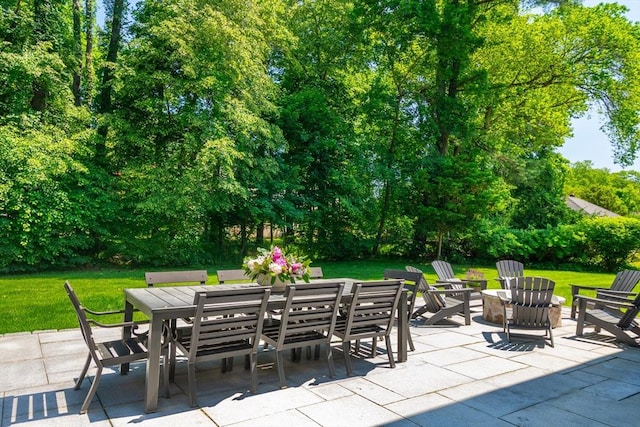 122 Crescent Rd, Concord, MA 01742 - view of patio with outdoor dining area and a fire pit