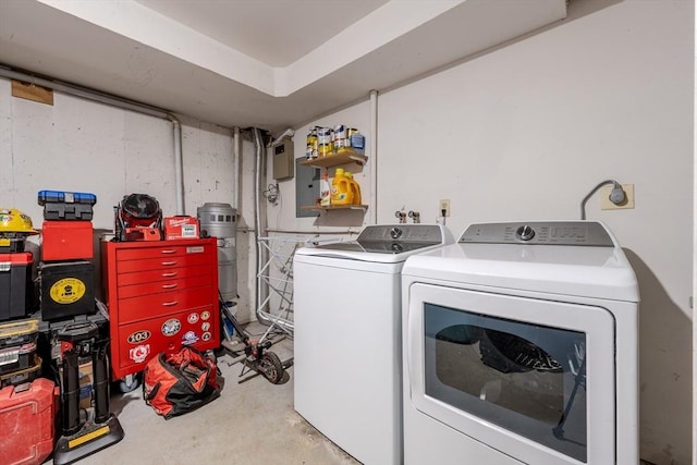 laundry area with separate washer and dryer