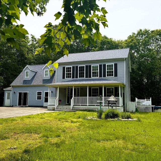 6 Debbie Ln, Freetown, MA 02702 - colonial inspired home with a porch, a front lawn, and roof with shingles