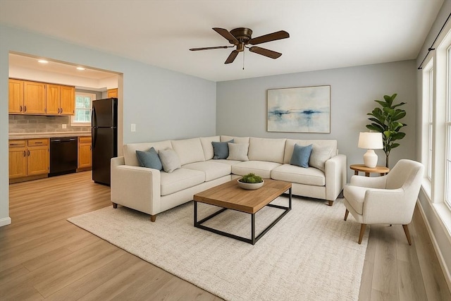 6 Debbie Ln, Freetown, MA 02702 - living area featuring light wood-type flooring and a ceiling fan