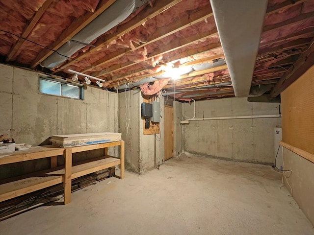 basement featuring water heater