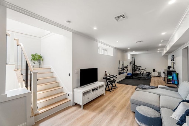 172 Orchard St Unit 172, Watertown, MA 02472 - living area featuring light wood-style flooring, stairway, crown molding, and recessed lighting