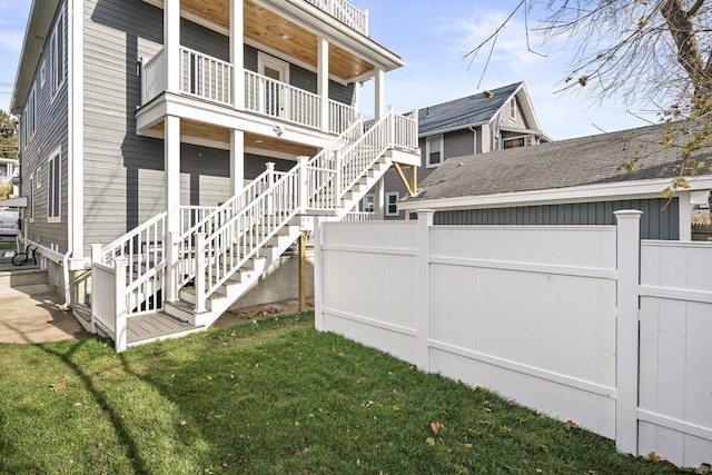 172 Orchard St Unit 172, Watertown, MA 02472 - back of house with stairs and a balcony