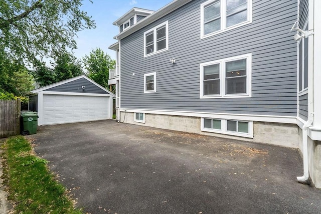 172 Orchard St Unit 172, Watertown, MA 02472 - view of side of home with a garage and an outbuilding