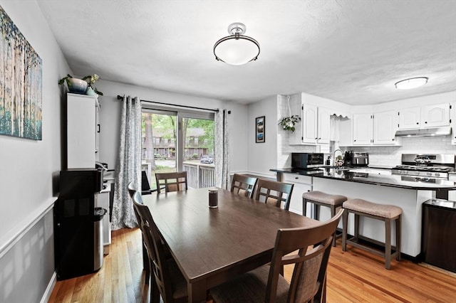 119 Wellman Ave Unit 119, Chelmsford, MA 01863 - dining space featuring light wood finished floors