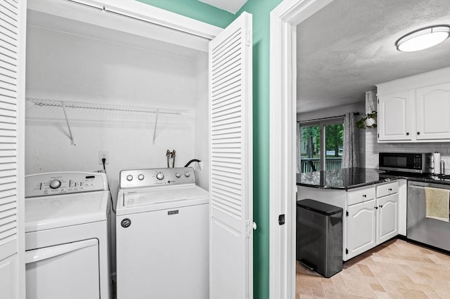 119 Wellman Ave Unit 119, Chelmsford, MA 01863 - laundry area featuring separate washer and dryer
